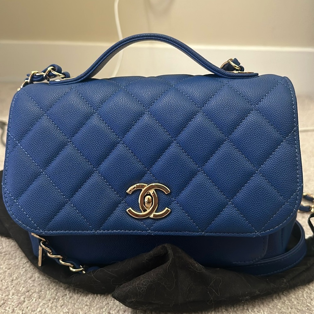 Chanel mini coco handle flap bag with front zipper. GREAT CONDITION.